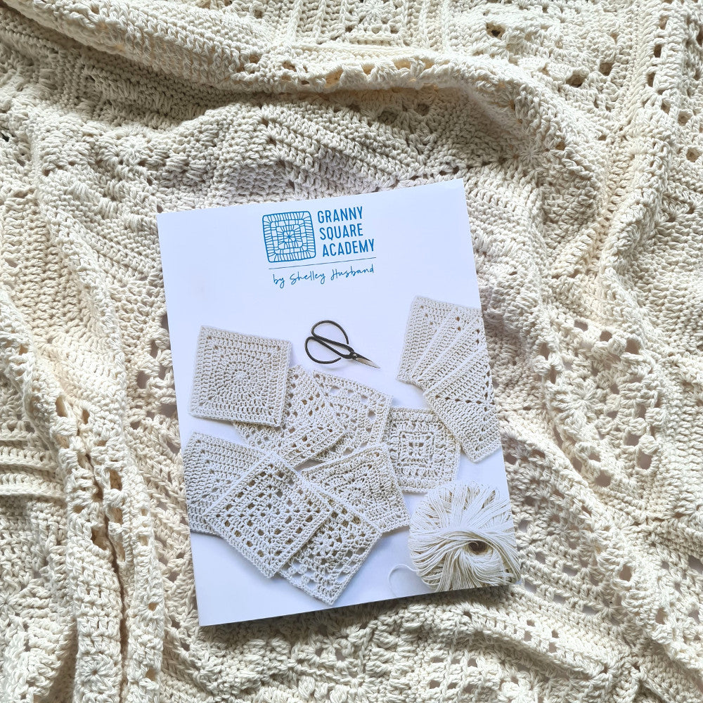 Granny Square Academy book on a Granny Square Academy sampler blanket