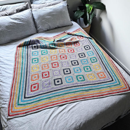 Cross Purposes Rainbow Blanket