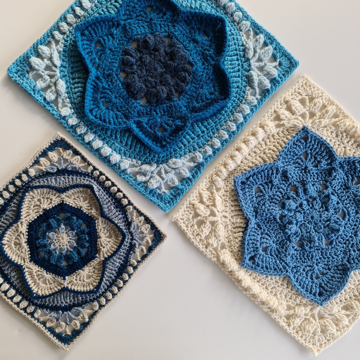 3 different versions of the floral granny square in various blues Asterales Crochet Granny Square Pattern by Shelley Husband