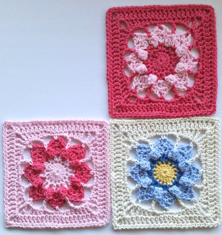 Three granny squares of Pinkie granny square pattern by Shelley Husband