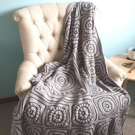 Beneath the Surface Crochet Blanket Pattern by Shelley Husband blanket over chair