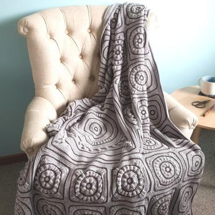 Blanket on chair from Beneath the Surface by Shelley Husband