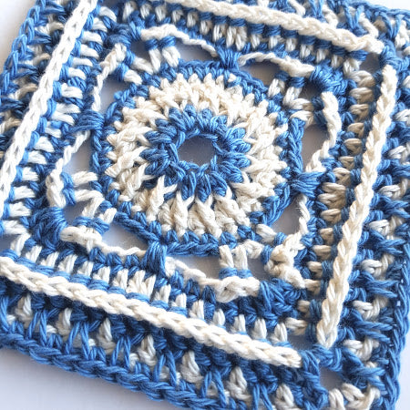 Close up of Baffin in two colours, blue and cream by Shelley Husband