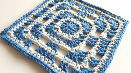 Close up Banda pattern in two colours, blue and cream by Shelley Husband