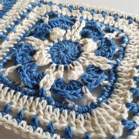 Close up of Caspian in two colours, blue and cream by Shelley Husband