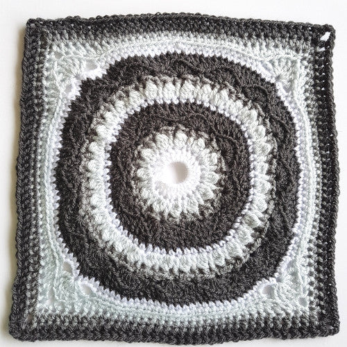 Dahlia Delight granny square pattern by Shelley Husband in three shades of grey