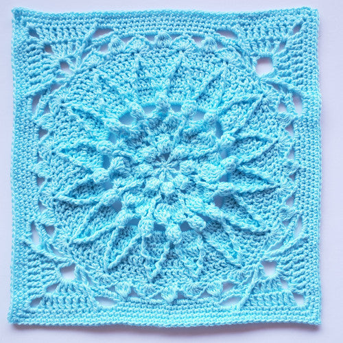 Giantess Blanket Pattern by Shelley Husband granny square in pale blue