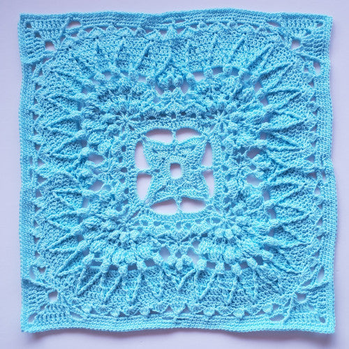 Giantess Blanket Pattern by Shelley Husband granny square in pale blue