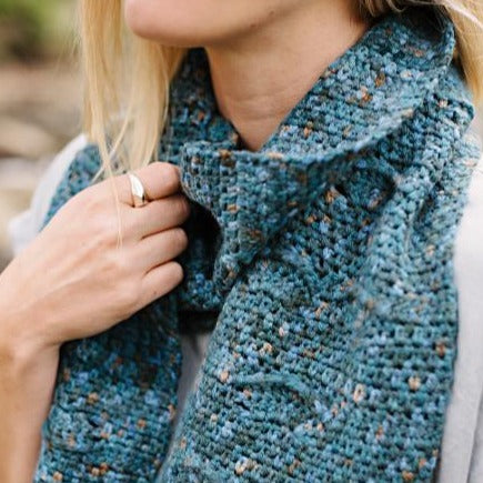 Close up of a woman wearing a Hillocks scarf by Shelley Husband