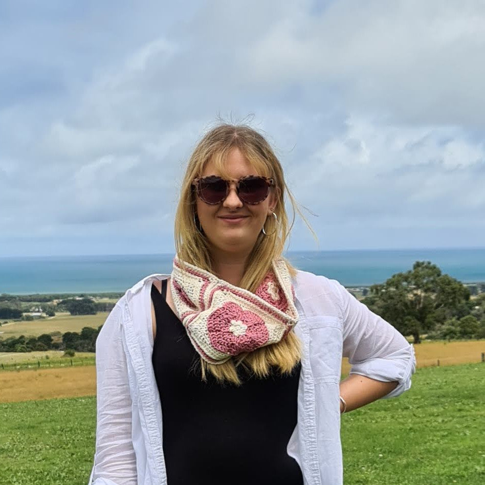 Iris Cowl by Shelley Husband worn by blonde woman with ocean in background