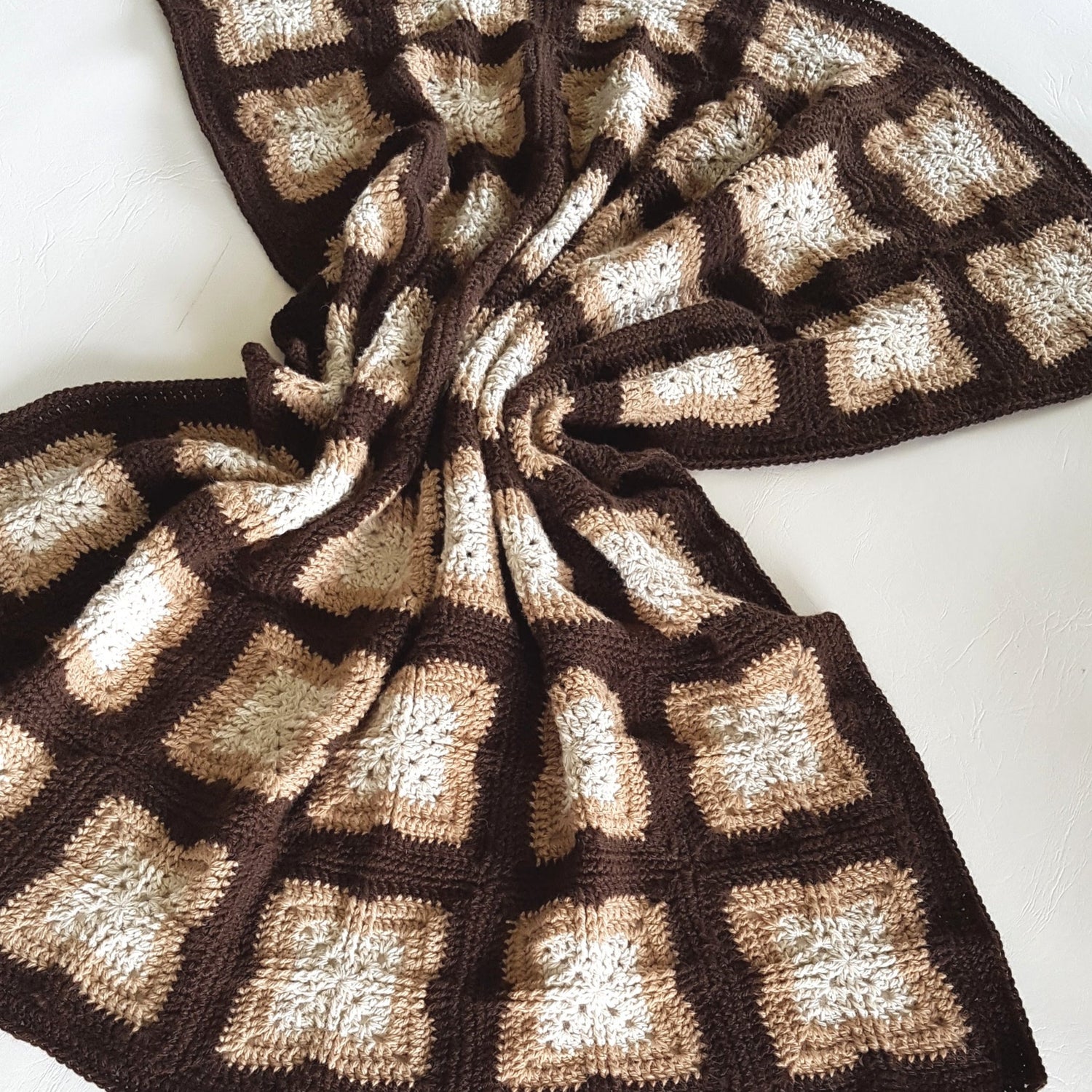 Rumple of Killarney Cross Blanket Pattern by Shelley Husband in browns
