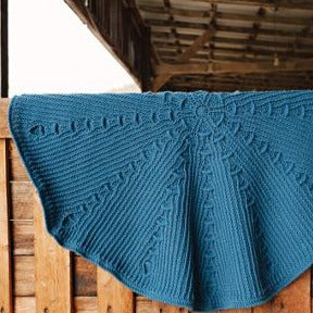 Millpond blanket by Shelley Husband over a half barn door