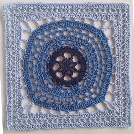 Blue granny square of Orbit granny square pattern by Shelley Husband