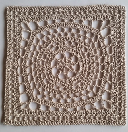 Tan granny square of Orbit granny square pattern by Shelley Husband