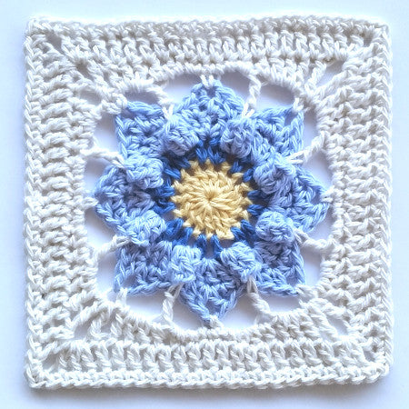 Blue, cream and yellow Pinkie granny square pattern by Shelley Husband