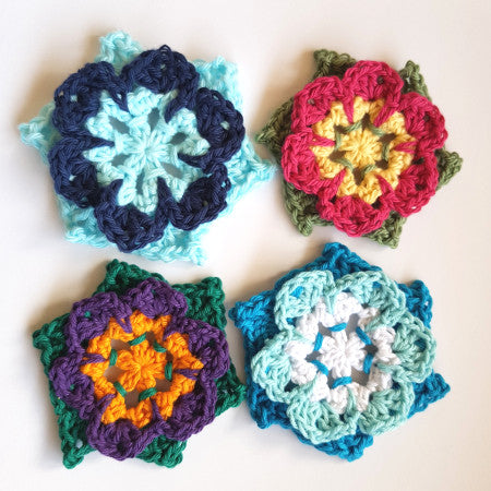 Four pinwheel flowers in different colours fromPinwheel Flower Pattern by Shelley Husband