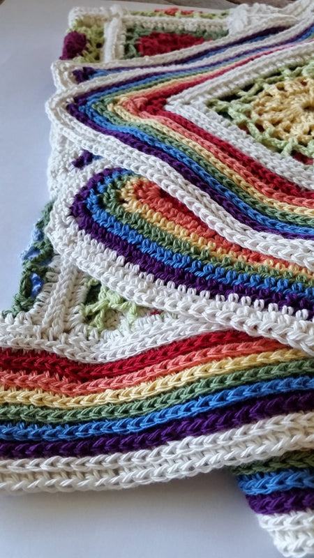 Close up of folded Posies and Pickets Blanket Pattern by Shelley Husband