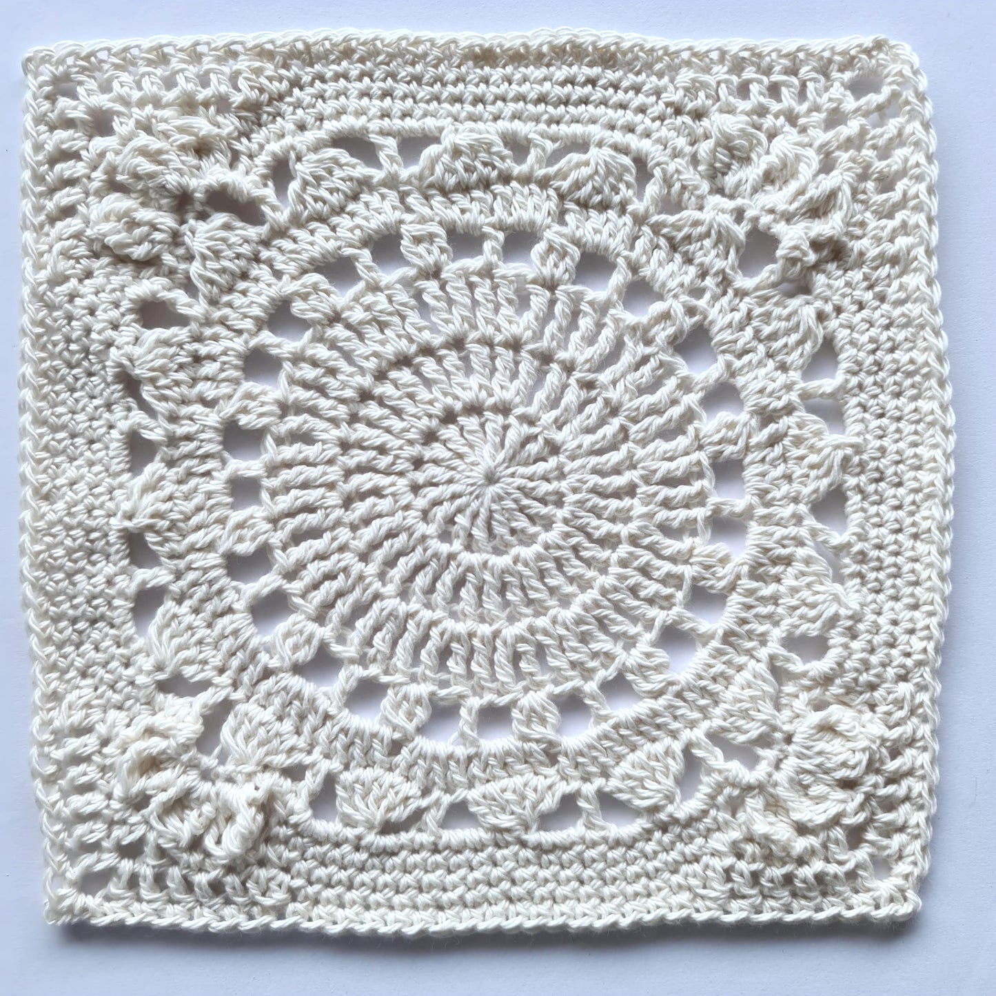 Cream granny square of The Pretender Granny Square Pattern by Shelley Husband