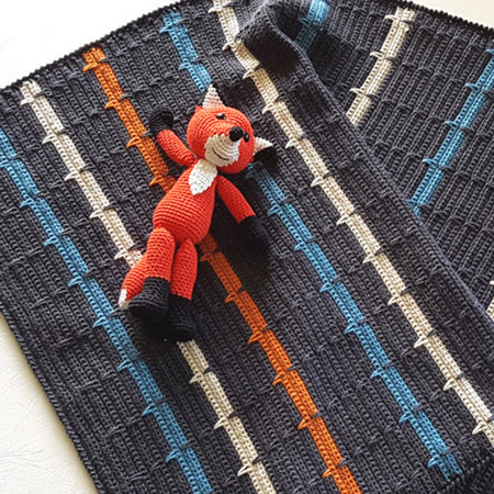 This Charming Boy Baby Blanket by Shelley Husband with a crochet fox on top