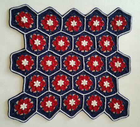 Hoya Hive Hexie Pattern in blue, red and cream by Shelley Husband