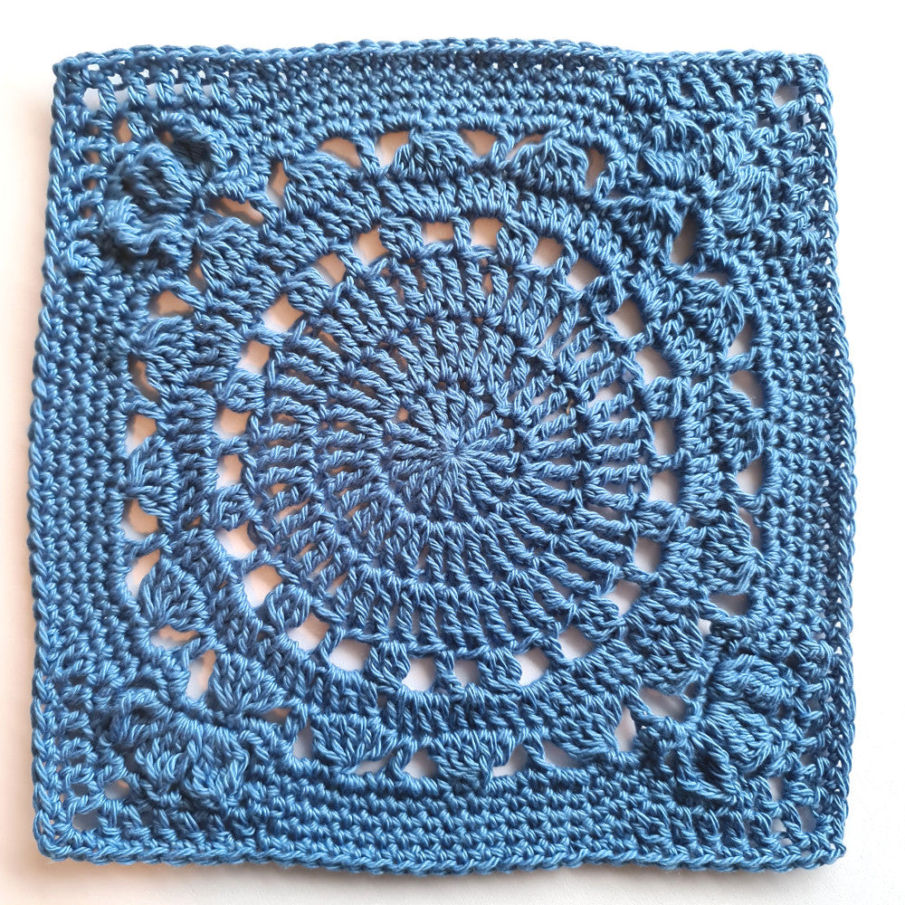 Blue granny square of The Pretender Granny Square Pattern by Shelley Husband