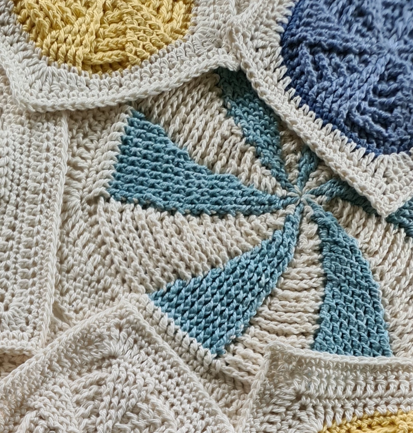 Close up of Vinyl Revival Granny square crochet patterns by Shelley Husband in different sizes and colours